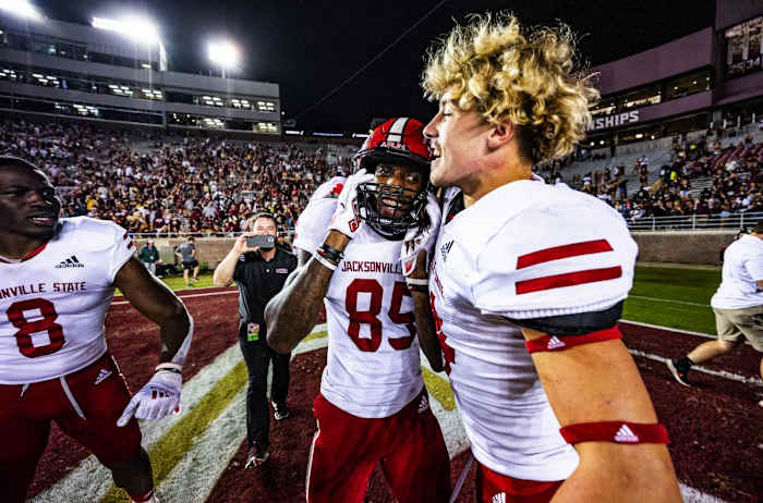 Jacksonville State receiver Damond Philyaw-Johnson hugs a teammate after his game-winning catch.